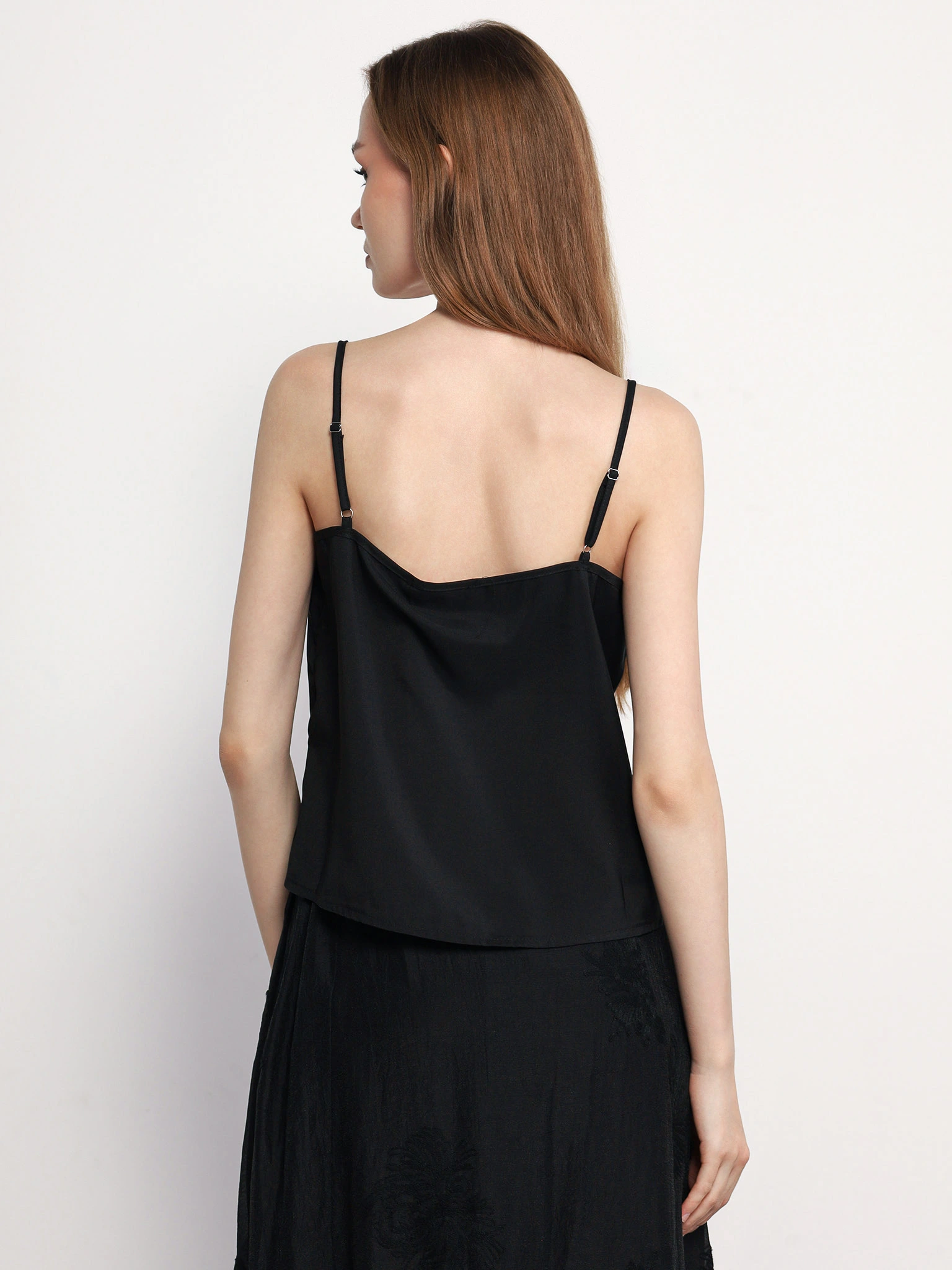 Топ черного цвета свободного кроя